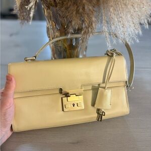 New , Gucci cream padlock bag with gold Accents. With box and dust bag .